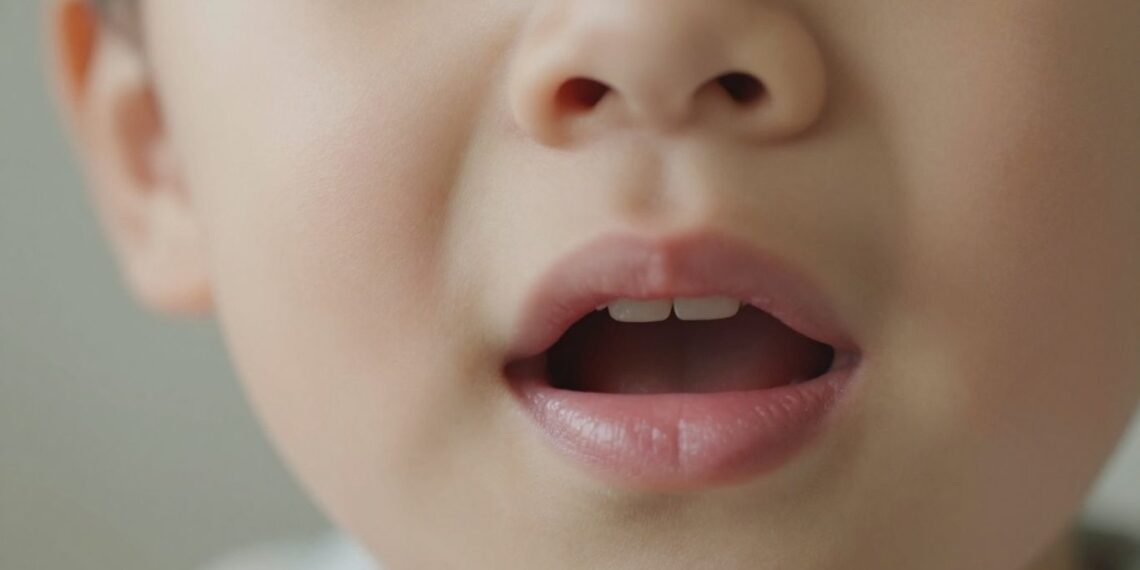 Close-up of a child's ear, nose, and throat.