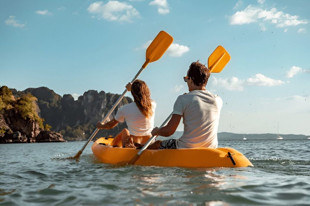 kayaking or canoeing concept with young couple