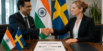 India and Sweden flags handshake business agreement | JustPicked India and Sweden flags, handshake, business agreement.