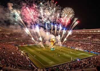 FIFA World Cup 2026 trophy celebration with fireworks.
